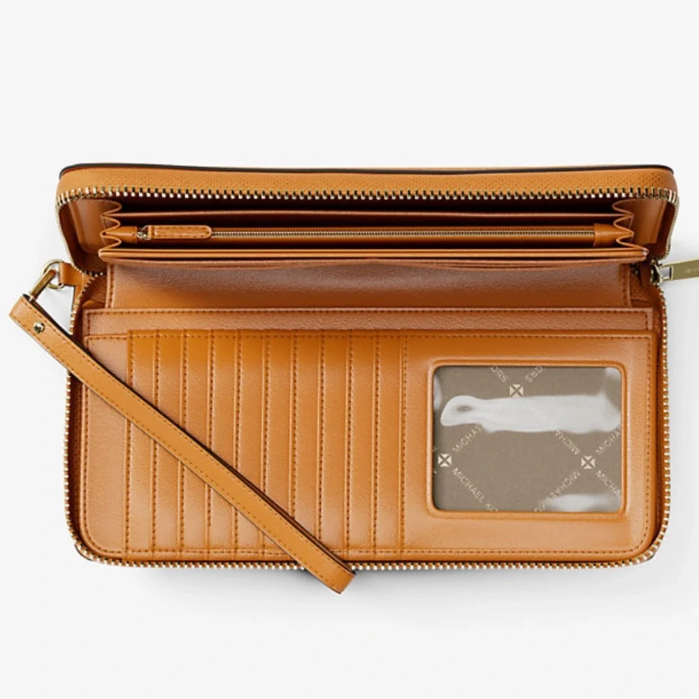 MICHAEL KORS Jet Set Travel Lg Pebbled Leather Continental Wristlet
Rad Orange - Picture 2 of 16
